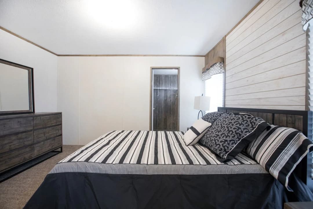 The southern farmhouse bedroom home features
