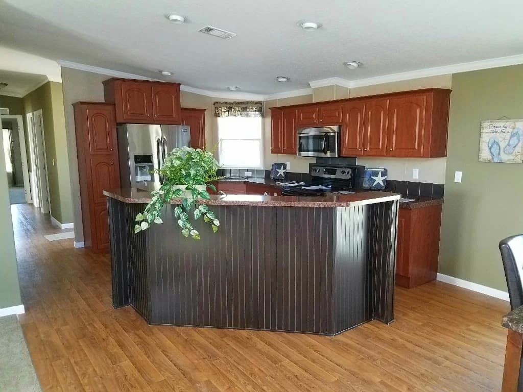 Islander 2856 with den/office kitchen home features